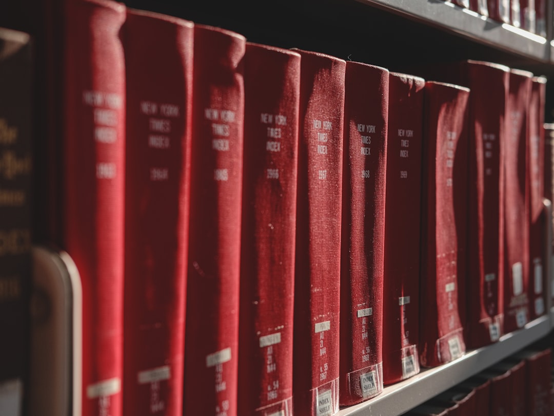 our-story red-books-stand-on-a-shelf-in-the-library-k6h9zxclqr4